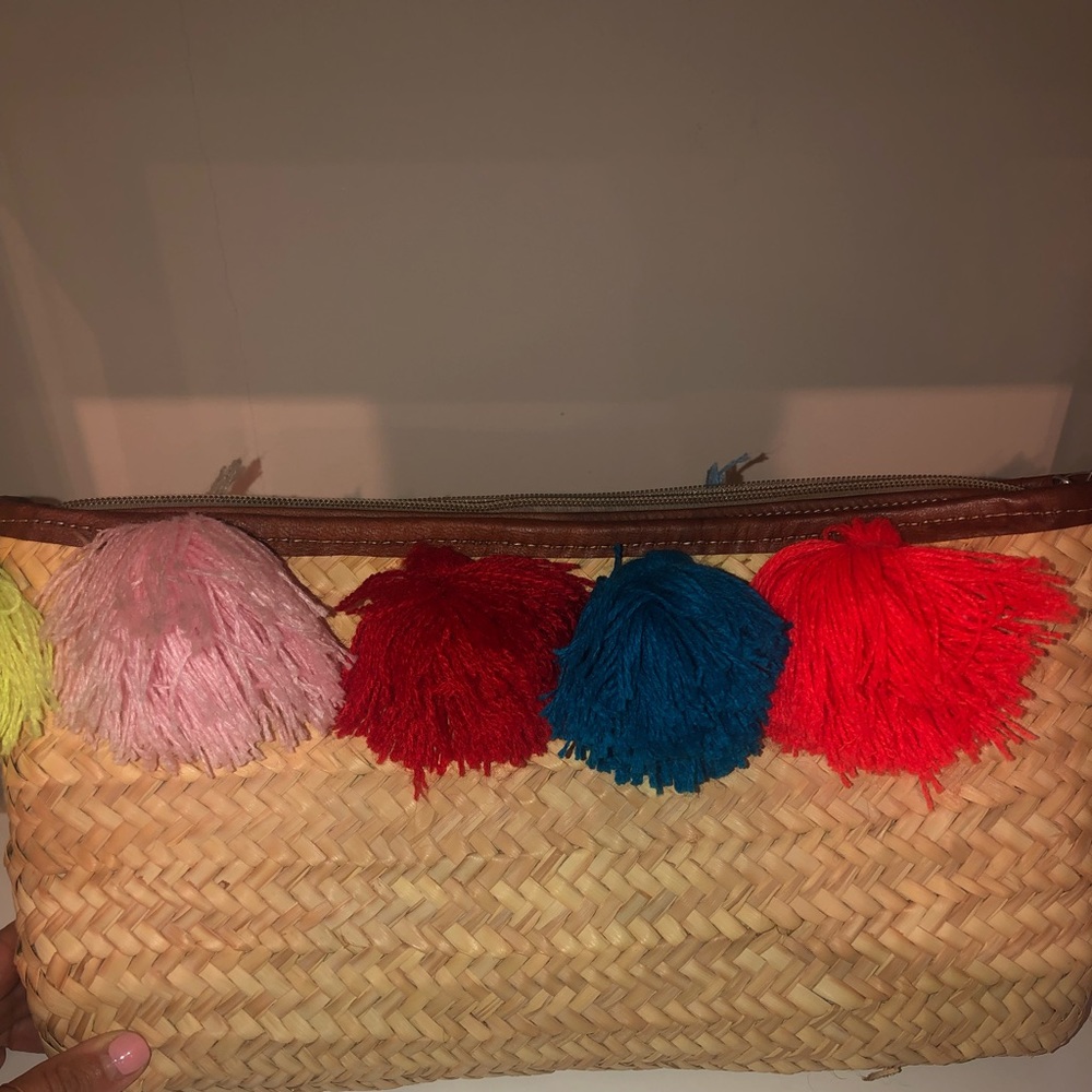 Wicker/straw clutch with colorful Pom poms